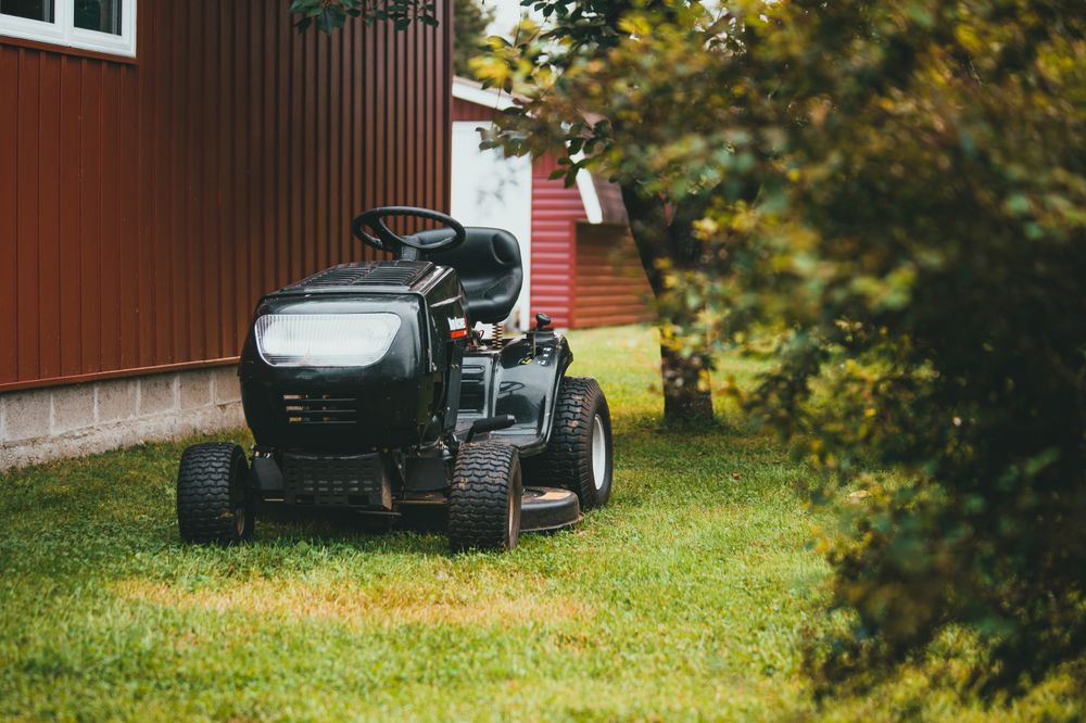 Riding mower maintaining a commercial property